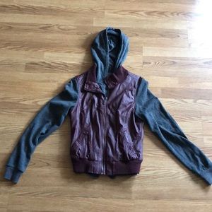 Maroon leather jacket with grey hoodie sleeves